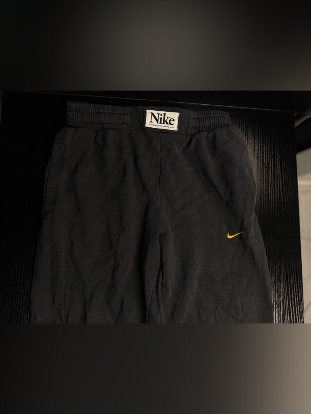 Vintage Nike Black Joggers with Yellow Swoosh Accent